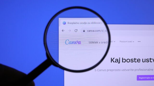 Лупа над началната страница на уебсайта на Canva – платформата пусна собствения си AI модел за изображения Craft