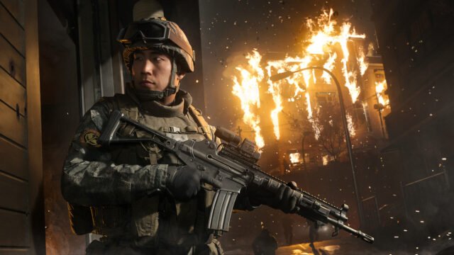 Войник с пушка пред горяща сграда в кампанията на Call of Duty: Modern Warfare 4